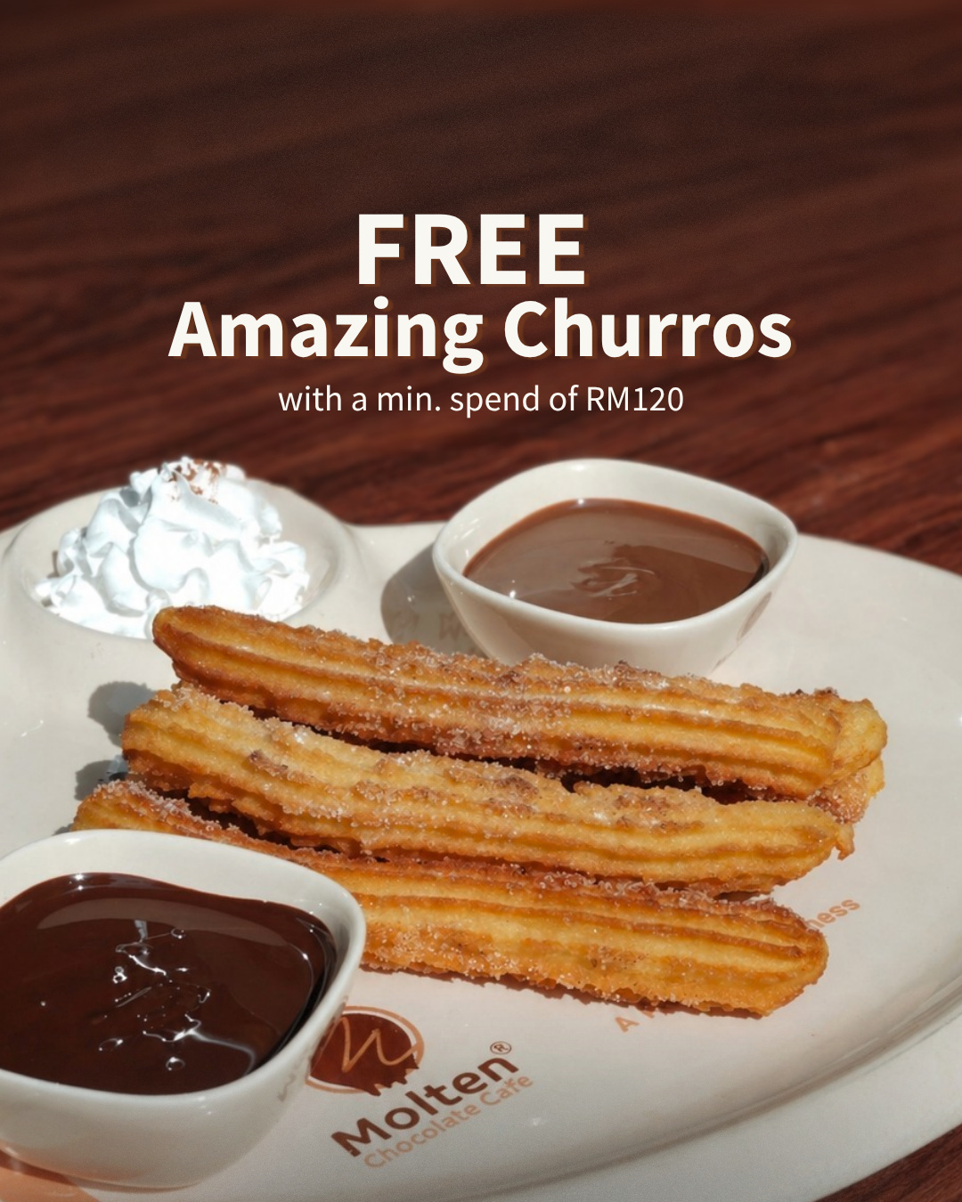 Close-up of churros with chocolate dips and whipped cream, with the text 'Free amazing churros with a minimum spend' (slide 3 of 3)