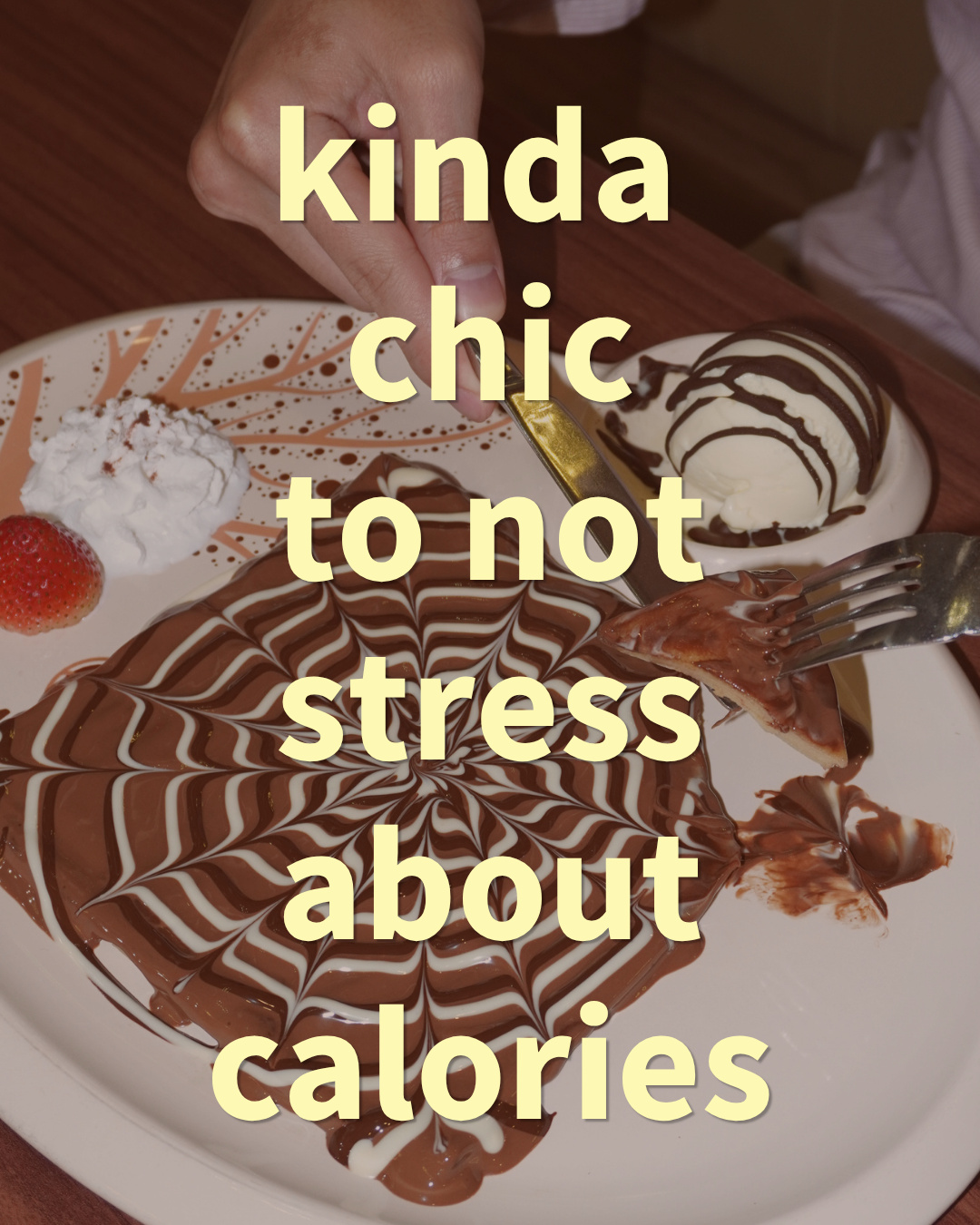 A swirl-patterned chocolate crepe being cut with a knife and fork, with the text 'kinda chic to not stress about calories' (slide 2 of 3)